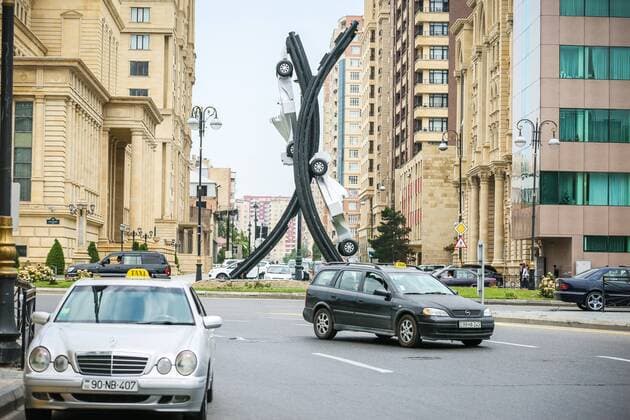 Baku: A silver car advertises A silver car advertises the first Baku Grand Prix.  AzizxKarimov