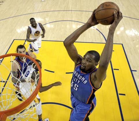 NBA, Playoffs, Golden State Warriors - Oklahoma City Thunder Oklahoma City Thunder s Kevin Durant (35) goes in for a dunk in the fourth quarter against the Golden State Warriors in Game 5 of the Western Conference Finals at Oracle Arena in Oakland, California on May 26, 2016. The Warriors defeated the Thunder 120-111. Pool photo by Carlos Avila Gonzalez UPI  SFP2016052627 CARLOSxAVILAxGONZALEZ