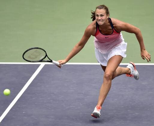 (160527) -- TIANJIN, May 27, 2016 -- Aryna Sabalenka of Belarus returns the ball during the singles quarterfinal against Peng Shuai of China in 2016 ITF Women s Circuit in north China s Tianjin Municipality, on May 27, 2016. Aryna Sabalenka won 2-0. ) (wll) (SP)CHINA-TIANJIN-TENNIS-ITF-WOMEN S CIRCUIT-SINGLES-QUARTERFINALS(CN) YuexYuewei 