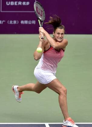 (160527) -- TIANJIN, May 27, 2016 -- Aryna Sabalenka of Belarus returns the ball during the singles quarterfinal against Peng Shuai of China in 2016 ITF Women s Circuit in north China s Tianjin Municipality, on May 27, 2016. Aryna Sabalenka won 2-0. ) (wll) (SP)CHINA-TIANJIN-TENNIS-ITF-WOMEN S CIRCUIT-SINGLES-QUARTERFINALS(CN) YuexYuewei 
