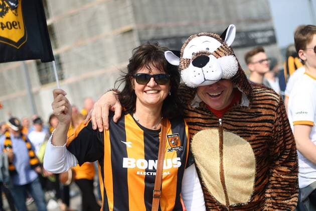 Hull fans arrive during the Skybet Championship Play Off Final match at Wembley Stadium. Championship, Hull City vs. Sheffield Wednesday EDITORIAL USE ONLY. No use with unauthorised audio, video, data, fixture lists, club league logos or live services. Online in-match use limited to 120 images, no video emulation. No use in betting, games or single club league player publications.