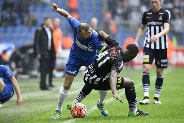 Genk s Thomas Buffel and Charleroi s Francis N Ganga fight for the ball during the Jupiler Pro League match between RC Genk and Charleroi, in Genk, on Sunday 29 May 2016, return leg match for European barrage in the Belgian soccer championship. YORICKxJANSENS  x04861115x