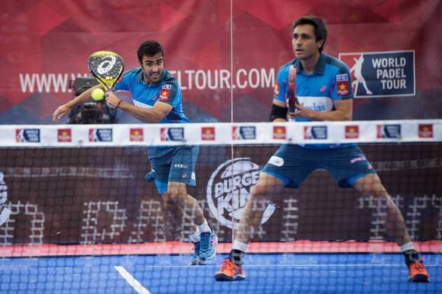Brazilian player Pablo Lima (L) and his teammate Argentinian Fernando Belasteguin (R) face Daniel Gutierrez (unseen) and Francisco Navarro (unseen) in the World Padel Tour Madrid Open s men final match in Las Rozas, outside Madrid, Spain, 29 May 2016. The team Lima -Belasteguin won the match by 6-1 and 6-2. World Padel Tour Madrid Open !ACHTUNG: NUR REDAKTIONELLE NUTZUNG!  20160529-636001376915066277