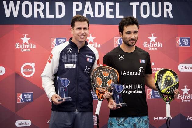 Argentinian Daniel Gutierrez (R) and his Spanish teammate Francisco Navarro (L) pose for photographer on podium after being defeated by Argentinian Fernando Belasteguin (unseen) and Brazilian teammate Pablo Lima (unseen) in the World Padel Tour Madrid Open s men final match in Las Rozas, outside Madrid, Spain, 29 May 2016. The team Lima-Belasteguin won the match by 6-1 and 6-2. World Padel Tour Madrid Open !ACHTUNG: NUR REDAKTIONELLE NUTZUNG!  20160529-636001388157183724