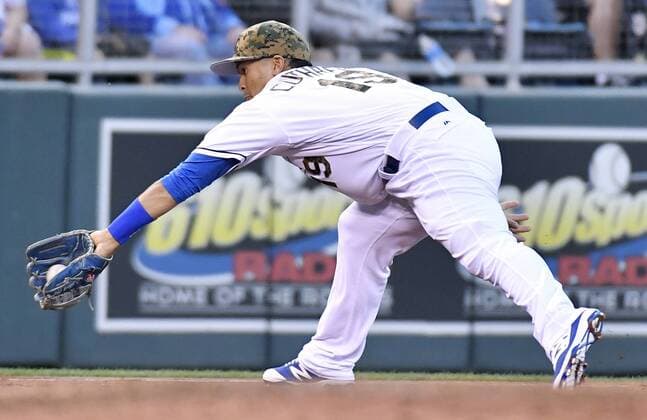 May 30, 2016 - Kansas City, MO, USA - Kansas City Royals third baseman Cheslor Cuthbert snags a grounder by Tampa Bay Rays Desmond Jennings and throws him out at first to end the top of the fourth inning on Monday, May 30, 2016, at Kauffman Stadium in Kansas City, Mo. Tampa Bay Rays at Kansas City Royals - ZUMAm67_