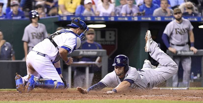 May 30, 2016 - Kansas City, MO, USA - Tampa Bay Rays Steve Pearce scores in front of Kansas City Royals catcher Drew Butera on a single by Steven Souza Jr. during the eighth inning on Monday, May 30, 2016, at Kauffman Stadium in Kansas City, Mo. Tampa Bay Rays at Kansas City Royals - ZUMAm67_