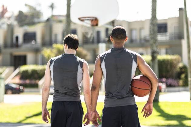Rear view of two basketball players outdoors model released Symbolfoto  LEF000111