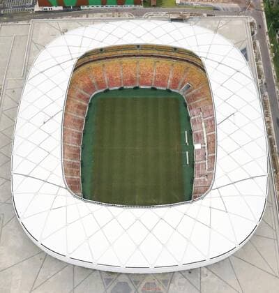Amazonia Arena in Manaus, Brazil Photo taken May 5, 2016, shows the Amazonia Arena, where group stage matches of the Rio 2016 Olympic soccer tournaments will be held in August, in Manaus in northern Brazil. 