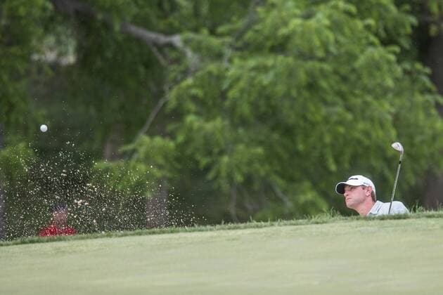 June 4, 2016 - Dublin, Ohio, U.S - Lucas Glover hits out of the bunker on the 18th hole during the third round of The Memorial Tournament at Muirfield Village Golf Club, Dublin, Ohio. Golf 2016 - The Memorial Tournament - Third Round - ZUMAs304
