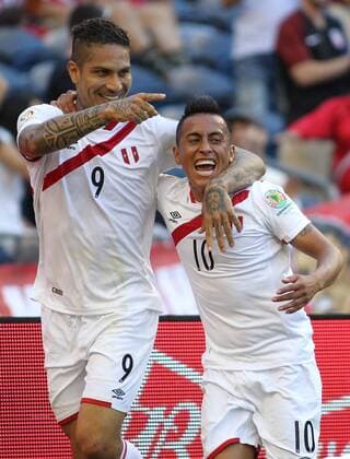 Peru s Paolo Guerrero (9) celebrates with teammate Christian Cueva (10) after scoring a goal during the second half against Haiti in a 2016 Copa America Centenario soccer match at CenturyLink Field in Seattle, Washington on June 4, 2016. Peru beat Haiti- 1-0.  SEA2016060414 JIMxBRYANT
