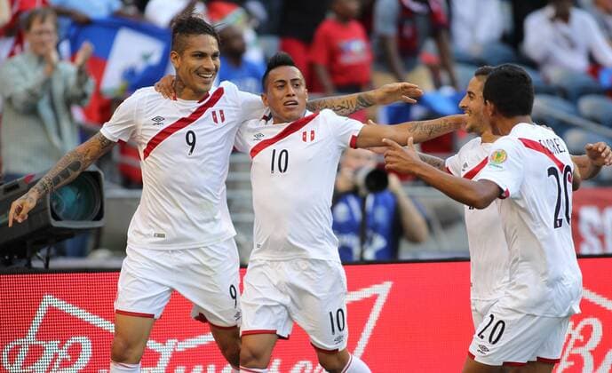 Peru s Paolo Guerrero (9) celebrates with teammates Christian Cueva (10), Yoshimar Yotun (19) and Edison Flores (20) after scoring a goal during the second half against Haiti in a 2016 Copa America Centenario soccer match at CenturyLink Field in Seattle, Washington on June 4, 2016. Peru beat Haiti- 1-0.  SEA2016060416 JIMxBRYANT
