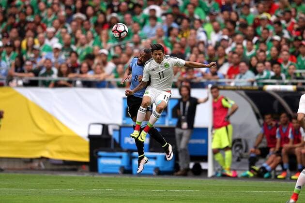 05 June 2016: Uruguay forward Abel Hernandez 8 and Mexico forward Javier Aquino fight for a loose ball during the first half of the Copa America Centanario game at University of Phoenix Stadium in Glendale, Az. (Photo by Chris Coduto Icon Sportswire) SOCCER: JUN 05 Copa America Centenario - Mexico v Uruguay Icon3171606050373 EDITORIAL USE ONLY