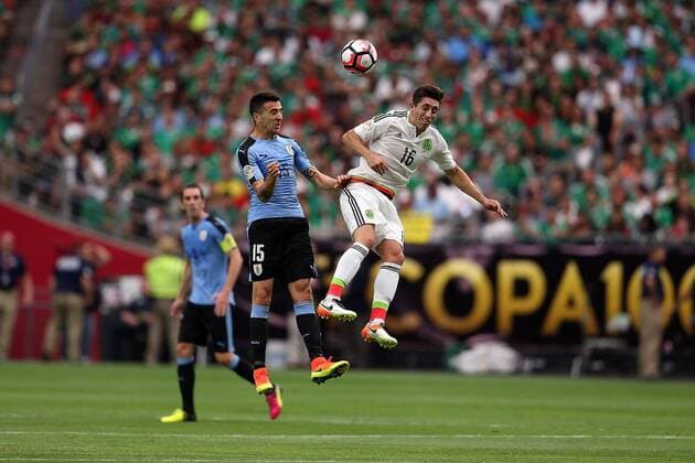 05 June 2016: Uruguay midfielder Matias Vecino 15 and Mexico midfielder Hector Herrera 16 fight for a loose ball during the first half of the Copa America Centanario game at University of Phoenix Stadium in Glendale, Az. (Photo by Chris Coduto Icon Sportswire) SOCCER: JUN 05 Copa America Centenario - Mexico v Uruguay Icon3171606050440 EDITORIAL USE ONLY