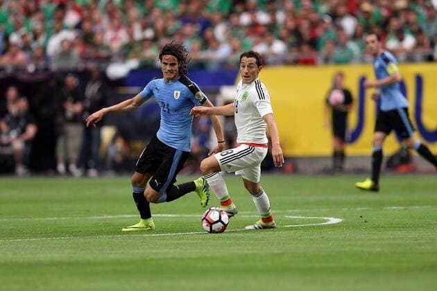 05 June 2016: Uruguay forward Edinson Cavani 21 and Mexico midfielder Andres Guarado during the first half of the Copa America Centanario game at University of Phoenix Stadium in Glendale, Az. (Photo by Chris Coduto Icon Sportswire) SOCCER: JUN 05 Copa America Centenario - Mexico v Uruguay Icon3171606050551 EDITORIAL USE ONLY