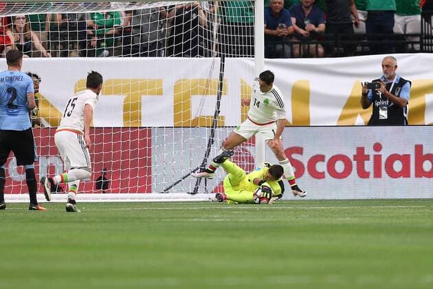 05 June 2016: Uruguay goalkeeper Fernando Muslera 1 makes a save over Mexico forward Javier Hernandez 14 during the first half of the Copa America Centanario game at University of Phoenix Stadium in Glendale, Az. (Photo by Chris Coduto Icon Sportswire) SOCCER: JUN 05 Copa America Centenario - Mexico v Uruguay Icon3171606050672 EDITORIAL USE ONLY