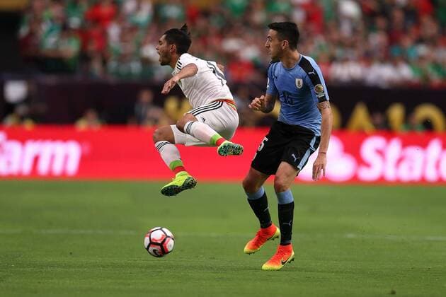 05 June 2016: Uruguay midfielder Matias Vecino 15 trips Mexico forward Jesus Manuel Corona 10 during the first half of the Copa America Centanario game at University of Phoenix Stadium in Glendale, Az. (Photo by Chris Coduto Icon Sportswire) SOCCER: JUN 05 Copa America Centenario - Mexico v Uruguay Icon3171606050801 EDITORIAL USE ONLY