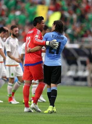 05 June 2016: Mexico goalkeeper Alfredo Talavera 12 (left) talks with Uruguay forward Edinson Cavani 21 during the first half of the Copa America Centanario game at University of Phoenix Stadium in Glendale, Az. (Photo by Chris Coduto Icon Sportswire) SOCCER: JUN 05 Copa America Centenario - Mexico v Uruguay Icon3171606050856 EDITORIAL USE ONLY