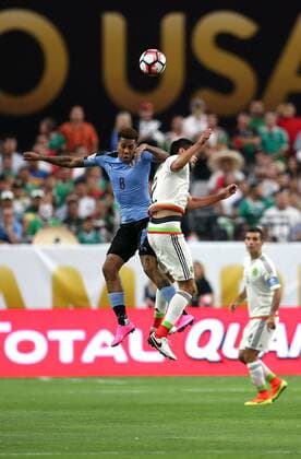 05 June 2016: Mexico defender N?stor Araujo 2 and Uruguay forward Abel Hernandez 8 fight for a ball during the second half of the Copa America Centanario game at University of Phoenix Stadium in Glendale, Az. Mexico won 3-1. (Photo by Chris Coduto Icon Sportswire) SOCCER: JUN 05 Copa America Centenario - Mexico v Uruguay Icon3171606051011 EDITORIAL USE ONLY