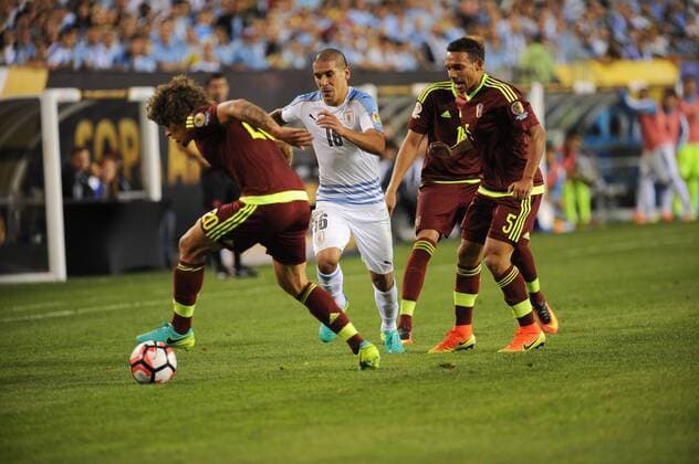 June 9, 2016 - Philadelphia, Pennsylvania, U.S - MAXIMILLANO PEREIRA (16) of Uruguay in action against ARQUIMEDES FIGUERA (5) of Venezuela during the Copa America match held at Lincoln Financial Field in Philadelphia Pa Soccer 2016-Copa America-Uruguay Vs Venezuela. - ZUMArf1_