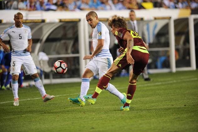 June 9, 2016 - Philadelphia, Pennsylvania, U.S - MAXIMILLANO PEREIRA (16) of Uruguay in action against ROLF FELTSCER (20) of Venezuela during the Copa America match held at Lincoln Financial Field in Philadelphia Pa Soccer 2016-Copa America-Uruguay Vs Venezuela. - ZUMArf1_