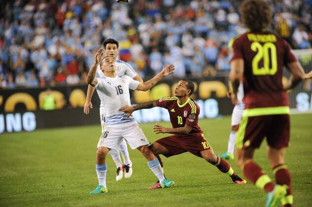 June 9, 2016 - Philadelphia, Pennsylvania, U.S - MAXIMILLANO PEREIRA (16) of Uruguay in action against ROMULO OTERO (10) of Venezuela during the Copa America match held at Lincoln Financial Field in Philadelphia Pa Soccer 2016-Copa America-Uruguay Vs Venezuela. - ZUMArf1_
