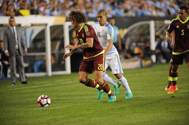 June 9, 2016 - Philadelphia, Pennsylvania, U.S - MAXIMILLANO PEREIRA (16) of Uruguay in action against ROLF FELTSCER (20) of Venezuela during the Copa America match held at Lincoln Financial Field in Philadelphia Pa Soccer 2016-Copa America-Uruguay Vs Venezuela. - ZUMArf1_