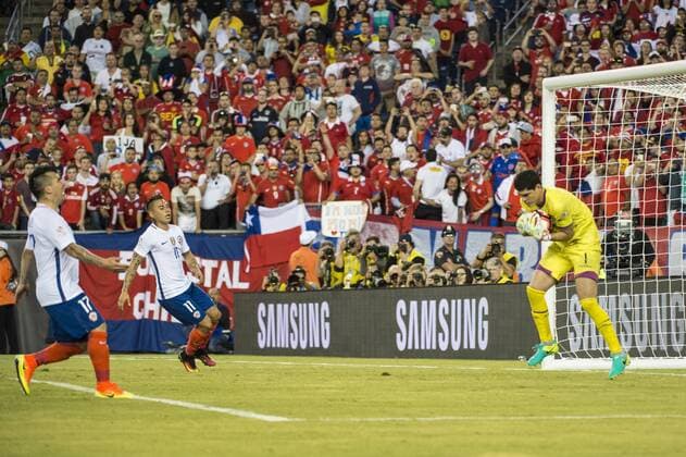 June 10, 2016 - Foxborough, Massachusetts, U.S - Bolivia goalkeeper CARLOS LAMPE (1) makes a save while Chile defender GARY MEDEL (17) & Chile forward EDUARDO VARGAS (11) look on during the Copa America Centenario football tournament at Gillette Stadium in Foxborough, MA. Soccer 2016 - Copa America Centenario Uruguay vs. Venezuela - ZUMAs192