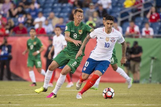 June 10, 2016 - Foxborough, Massachusetts, U.S - Chile midfielder PABLO HERNANDEZ (10) takes the ball away from Bolivia midfielder MARTIN SMEDBERG-DALENCE (8) during the Copa America Centenario football tournament at Gillette Stadium in Foxborough, MA. Soccer 2016 - Copa America Centenario Uruguay vs. Venezuela - ZUMAs192