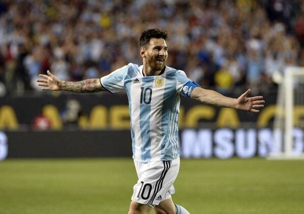 Argentina midfielder Lionel Messi reacts after scoring his second goal against Panama on a free kick during the second half of a 2016 Copa America Centenario Group D match against Panama at Soldier Field in Chicago on June 10, 2016. Messi scored 3 goals as Argentina defeated Panama 5-0.  CHI2016061016 BRIANxKERSEY