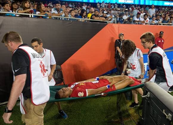 Panama forward Valentin Pimentel is taken from the field on a stretcher after an injury during the first half of a 2016 Copa America Centenario Group D match against Argentina at Soldier Field in Chicago on June 10, 2016. Argentina defeated Panama 5-0.  CHI2016061009 BRIANxKERSEY