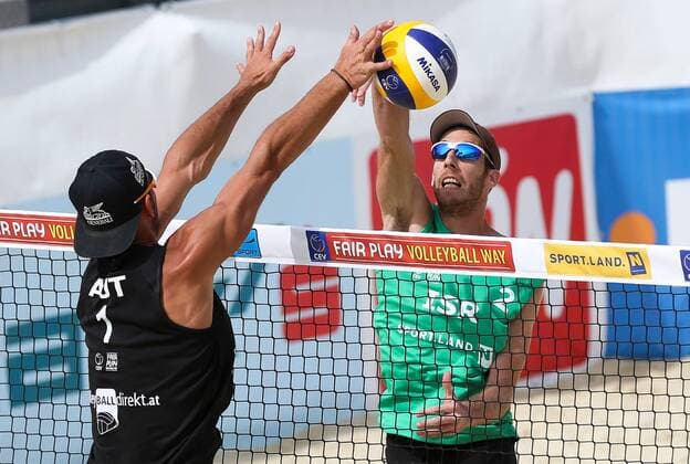 Beach volleyball Beachvolleyball - CEV Continental Cup BADEN BEI WIEN,AUSTRIA,11.JUN.16 - BEACH VOLLEYBALL - CEV Continental Cup, ladies, final. Image shows Martin Ermacora (AUT) and Ariel Hilman (ISR). GEPAxpictures xPhilippxBrem