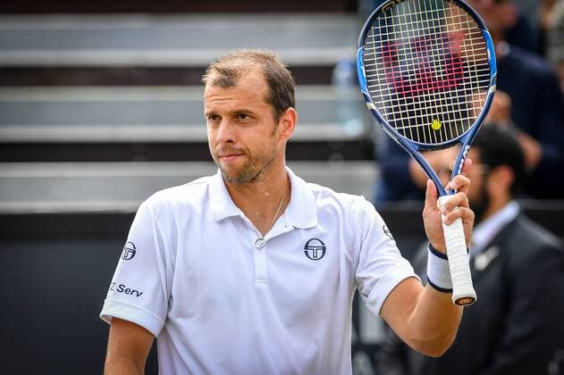 Luxembourg s Gilles Muller celebrates after winning a tennis game between Luxemburger Gilles Muller and Croatian Ivo Karlovic in the semi finals of the Men s singles at the Ricoh Open ATP Tennis Herren tennis tournament in Rosmalen, the Netherlands, Saturday 11 June 2016. LUCxCLAESSEN  x04869554x
