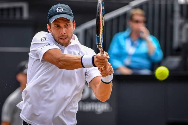 Luxembourg s Gilles Muller pictured in action during a tennis game between Luxemburger Gilles Muller and Croatian Ivo Karlovic in the semi finals of the Men s singles at the Ricoh Open ATP Tennis Herren tennis tournament in Rosmalen, the Netherlands, Saturday 11 June 2016. LUCxCLAESSEN  x04869578x