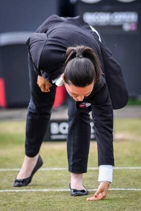 Referee is checking the court during rain in a tennis game between Swiss Belinda Bencic and French Kristina Mladenovic in the semi-finals of the women s singles at the Ricoh Open WTA Tennis Damen tennis tournament in Rosmalen, the Netherlands, Saturday 11 June 2016. LUCxCLAESSEN  x04869634x