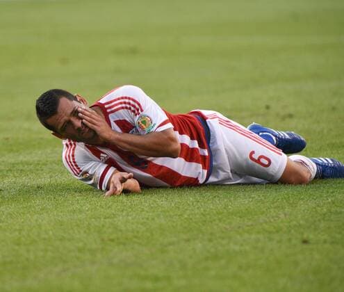 June 11, 2016 - Philadelphia, Pennsylvania, U.S - Paraguay s MIGUEL SAMUDIO, lays hurt on the pitch during the Copa America match played at Lincoln Financial Field in Philadelphia Pa Soccer 2016-Copa America-USA Vs Paraguay. - ZUMArf1_