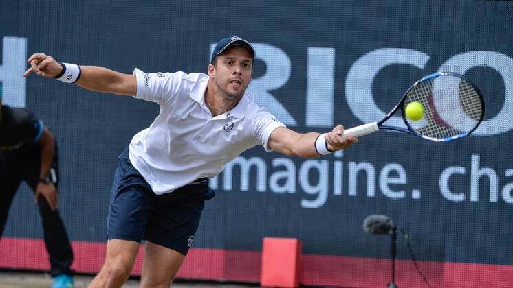 June 11, 2016 - Rosmalen, Netherlands - Gilles Muller (LUX) versus Ivo Karlovic (CRO) during the first set of their semifinal match on Saturday 11th of June 2016 at the Ricoh Open Grass Court Championships at the Autotron in Rosmalen in the Netherlands. ATP Tennis Herren and WTA Tennis Damen Ricoh Open 2016  - ZUMAn230