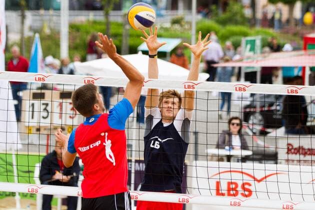Angriff Jannis Hopt (United Volleys RheinMain) - Block Peter Wolf (TG Ruesselsheim); LBS Cup Beachvolleyball Friedrichshafen, Promenade, Friedrichshafen Germany, 20160612; Friedrichshafen Copyright: Wuechnerx xEibner-Pressefoto EP_nwr