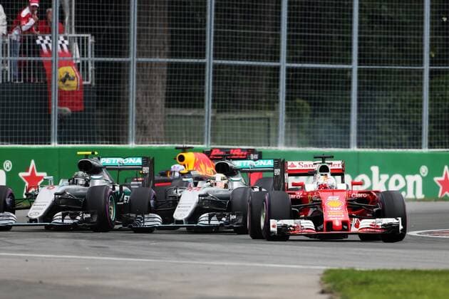 Canadian Grand Prix, Montreal 09 - 12 June 2016 12.06.2016 - Race, Sebastian Vettel (GER) Ferrari SF16-H leads Lewis Hamilton (GBR) Mercedes AMG F1 W07 Hybrid and Nico Rosberg (GER) Mercedes AMG F1 W07 Hybrid at the start of the race. 