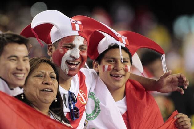 Peru fans cheer for their team after they defeated Brazil in the 2016 Copa America Centenario Group B match at Gillette Stadium in Foxborough, Massachusetts on June 12, 2016. Peru defeated Brazil 1-0.  BOS2016061219 MATTHEWxHEALEY