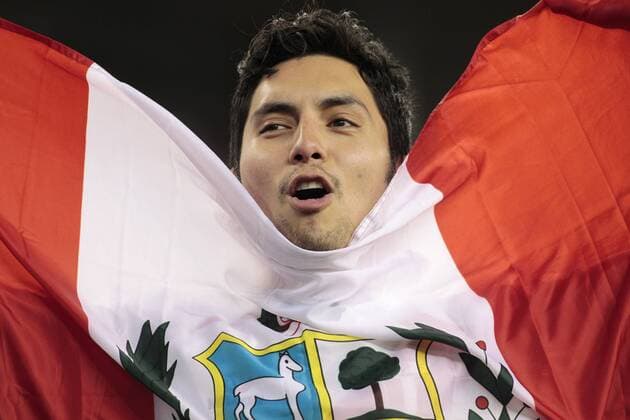 A Peru fan cheers for his team after they defeated Brazil in the 2016 Copa America Centenario Group B match at Gillette Stadium in Foxborough, Massachusetts on June 12, 2016. Peru defeated Brazil 1-0.  BOS2016061220 MATTHEWxHEALEY