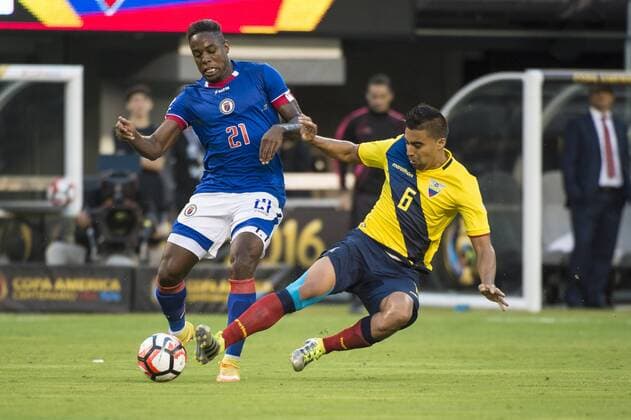 East Rutherford, New Jersey, U.S - Ecuador midfielder CRISTIAN NOBOA (6) slides in on Haiti forward DUCKENS NAZON (20) during the Copa America Centenario USA 2016 soccer tournament at MetLife Stadium in East Rutherford, NJ Soccer 2016 - Copa America Centenario Ecuador vs. Haiti 4-0 - ZUMAs192