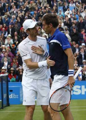 14.06.2016. Queens Club, London, England. Aegon Queens Tennis Championships Day Two. Andy Murray (GBR) consoles Nicolas Mahut (FRA) at the end of their 1st round match won by Murray in straight sets 7-6 and 7-6 xAlanxMartinx  ActionPlus11749118