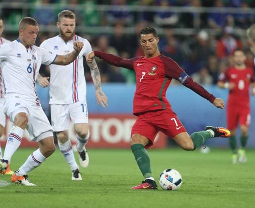Cristiano Ronaldo of Portugal has a shot on goal during the UEFA European Championship EM Europameisterschaft 2016 match at the Stade Geoffroy Guichard, Saint Etienne. Picture date June 14th, 2016 Pic Phil Oldham Sportimage EDITORIAL USE ONLY. No use with unauthorised audio, video, data, fixture lists, club league logos or live services. Online in-match use limited to 120 images, no video emulation. No use in betting, games or single club league player publications.