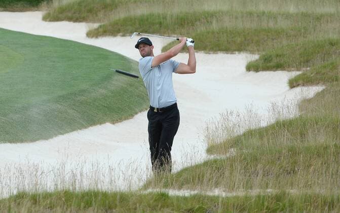 Kevin Tway hits out of the Church Pews bunkers during a practice round prior to the start of the 2016 U.S. Open at Oakmont Country Club in Oakmont, Pennsylvania on June 15, 2016.  PIT20160615404 PATxBENIC