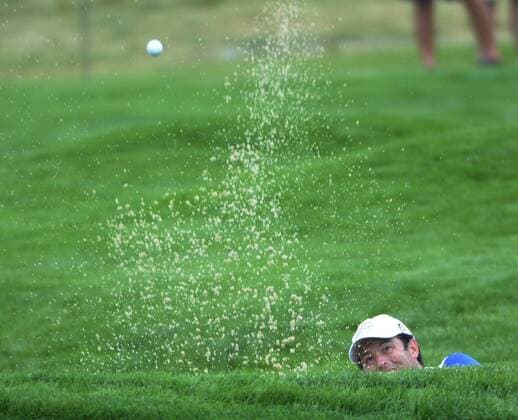 Robert Streb hits from the bunker on the 15th hole during the first round of the U.S. Open golf championship at Oakmont Country Club near Pittsburgh, Pennsylvania on Thursday, June 16, 2016.  OAK20160616106 PATxBENIC