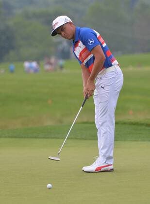 Rickie Fowler putts on the 11th green during the first round of the 2016 U.S. Open at Oakmont Country Club in Oakmont, Pennsylvania on June 16, 2016.  OAK20160616330 KEVINxDIETSCH