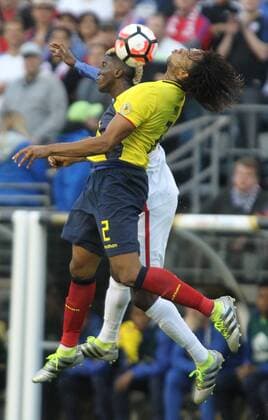 USA s Gyasi Zardes, back, and Ecuador s Arturo Mina (2) fight for a header in a 2016 Copa America Centenario soccer quarterfinals at CenturyLink Field in Seattle, Washington on June 16, 2016. USA beats Ecuador 2-1 to advance to the semi-finals.  SEA2016061617 JIMxBRYANT