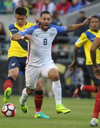 USA s Clint Dempsey dribbles past Ecuador s Fernando Gailbor (8) in a 2016 Copa America Centenario soccer quarterfinals at CenturyLink Field in Seattle, Washington on June 16, 2016. USA beats Ecuador 2-1 to advance to the semi-finals.  SEA2016061615 JIMxBRYANT