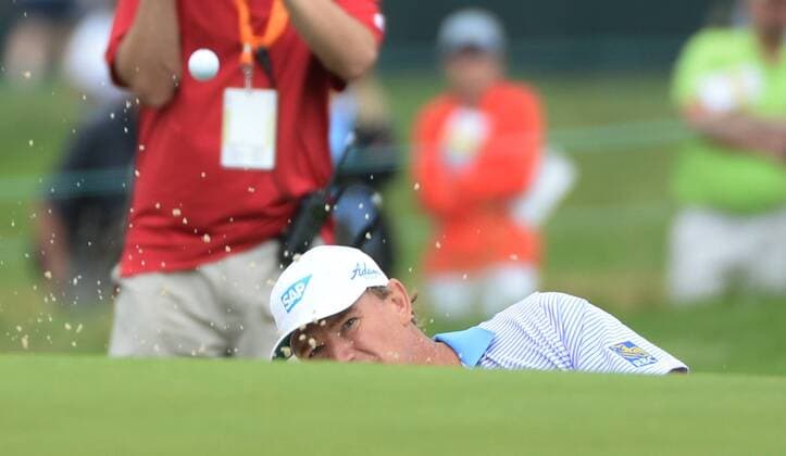 Ernie Els, of South Africa, hits from a sand trap on the fourth hole of his first round during the Friday round of the U.S. Open golf championship at Oakmont Country Club near Pittsburgh, Pennsylvania on June 17, 2016. Els was just starting his first round due to the rain delays yesterday and will play his second 18 later today.  OAK20160617105 PATxBENIC