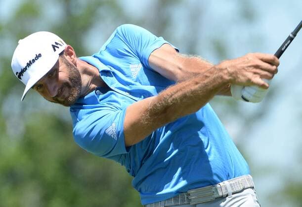 Dustin Johnson hits his drive on the 18th hole of his first round during the Friday round of the U.S. Open golf championship at Oakmont Country Club near Pittsburgh, Pennsylvania on June 17, 2016. Johnson finished at three under par, one back after the first round, which was delayed because of rain yesterday. Johnson will play his second round later in the day.  OAK20160617126 PATxBENIC